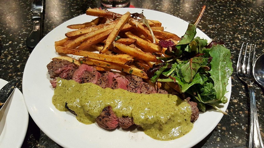 Georges French Bistro signature dishes Steak Frites, French Onion Soup, Escargots de Bourgogne, Duck Confit
